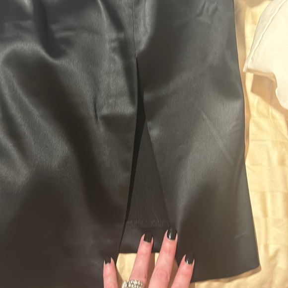 Pre-loved sexy Bebe skirt (satin feel) see pic of tag with actual material. - Picture 5 of 9